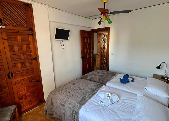 En La Felicidad 德尼亚